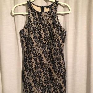 Nude dress with black lace overlay